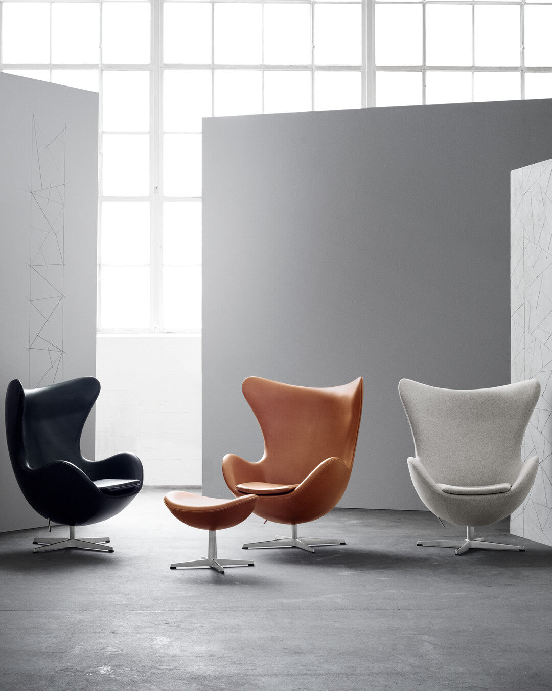 Poltrona lounge Egg, con pouf